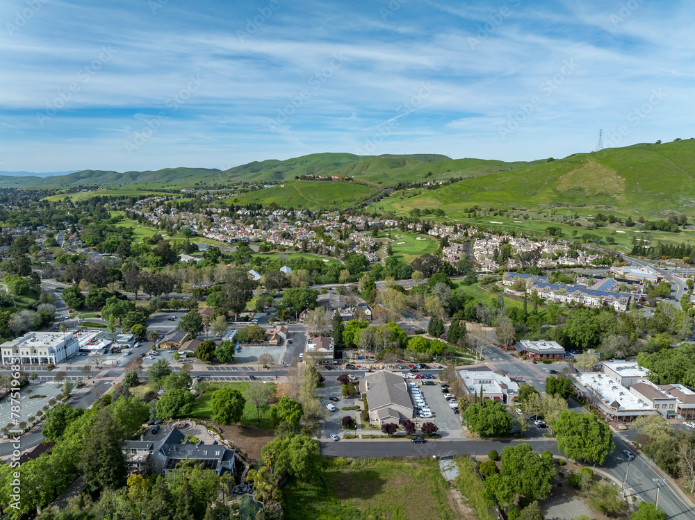 Drone landscape photos over the beautiful landscape of Clayton, California with homes, streets and green hills.