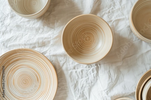 Group of Bowls on White Sheet