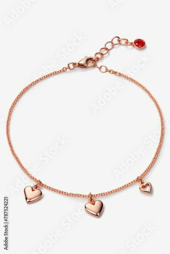 A sleek rose gold anklet embellished with tiny heart charms