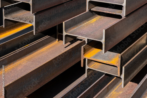 Steel construction beams at the construction site, filled with construction material. the metal industry in construction.