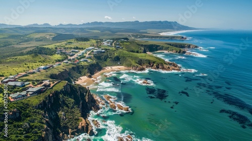 A sprawling coastal landscape with crystal clear waters and sandy beaches contrasts against the vibrant greenery of the Garden Route. . AI generation. © Justlight