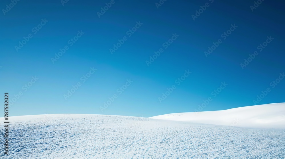 pristine winter snowfield under a clear blue sky, the stark white contrasting with deep blue, a minimalist scene