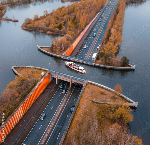 Aquaduct Veluwemeer in the Netherlands, boat passing over the highway