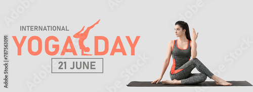 Young woman practicing yoga...