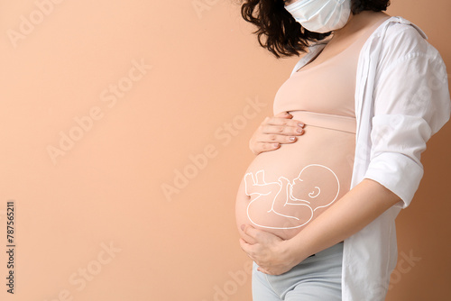 Young pregnant woman in med...