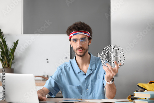 Male student with molecular...