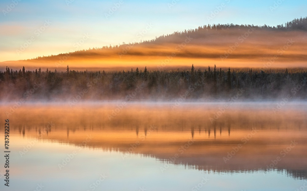 Autumnal fog atmosphere on the lake shore in the evening light, Jokkmokk, Norrbottens laen, Sweden, Europe Autumnal fog atmosphere on the lake shore in the evening light, Jokkmokk, Norrbottens laen, Sweden, Europe