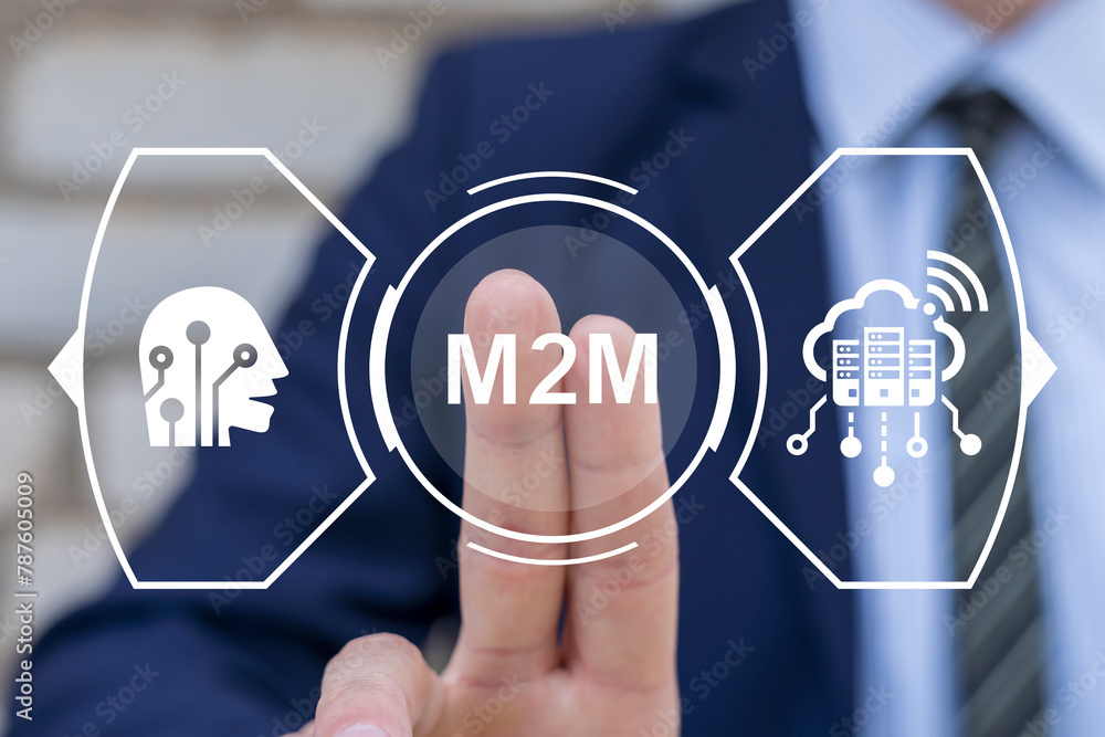 Business man using virtual touch screen presses abbreviation: M2M. M2M Machine-to-Machine Business Industry concept. Machine to Machine Smart Production Artificial Intelligence technology. Business man using virtual touch screen presses abbreviation: M2M. M2M Machine-to-Machine Business Industry concept. Machine to Machine Smart Production Artificial Intelligence technology.