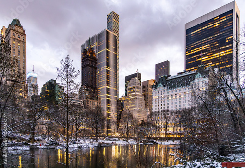 Central Park at Night in the Winter with refelections in the city.  photo