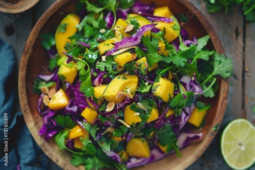 Salad with mango mangetout cabbage coriander lime and ginger dressing photo