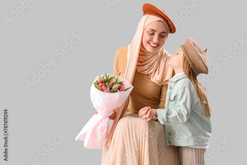 Young Muslim woman with tul...
