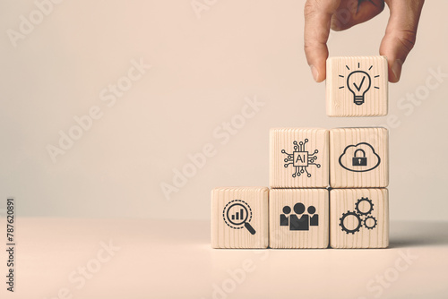 Assembled wooden cubes on the topic of the application of artificial intelligence in business