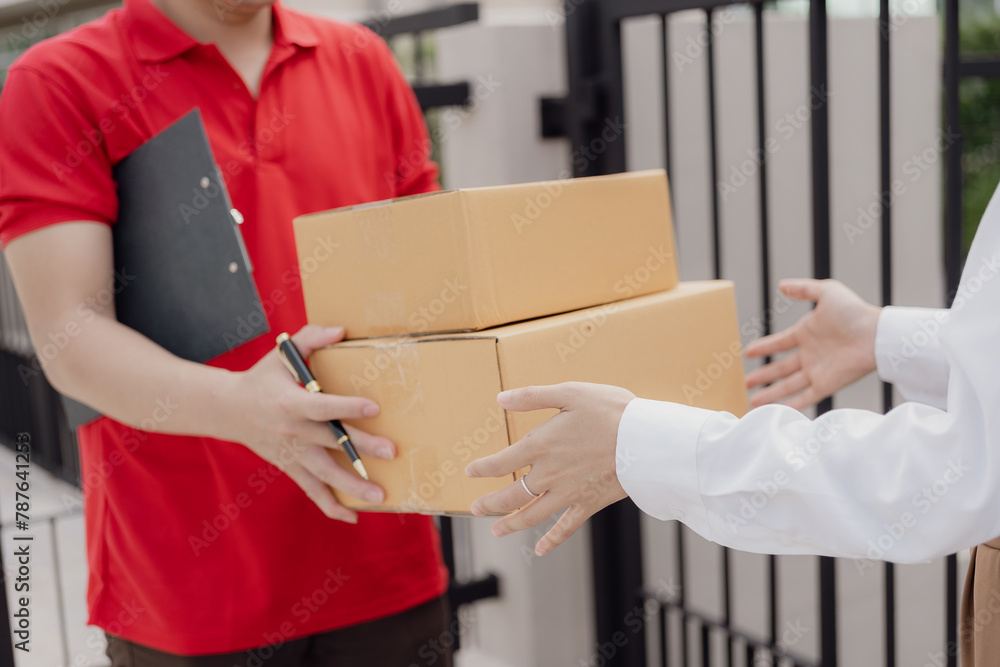 custom made wallpaper toronto digitalLogistics concept A parcel or delivery service stands at the door of a service provider or product for online shopping, shipping or e-commerce. .Close-up image of paying via mobile phone