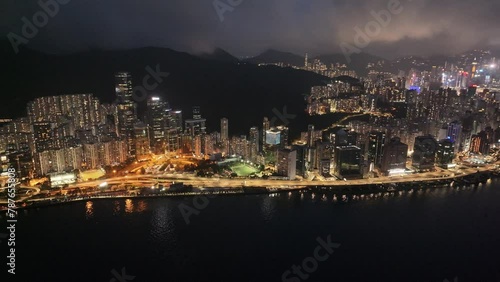 Aerial drone dusk nightfall skyview of residential and commerciall in Hong Kong East District near Victoria Harbour Kings Road in Tai Koo Shing North Point Quarry Bay Shau Kei Wan Sai Wan Ho photo