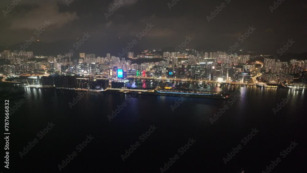 Aerial drone dusk nightfall skyview of seaside commercial residential in Kai Tak Sports Park Cruise Terminal Hong Kong Kowloon city Kwun Tong Kowloon Bay near Victoria harbor, Aerial drone skyview Aerial drone dusk nightfall skyview of seaside commercial residential in Kai Tak Sports Park Cruise Terminal Hong Kong Kowloon city Kwun Tong Kowloon Bay near Victoria harbor, Aerial drone skyview
