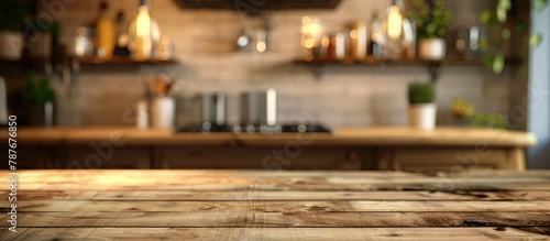 Wooden tabletop on a blurred kitchen background, suitable for showcasing products or designing visual layouts.