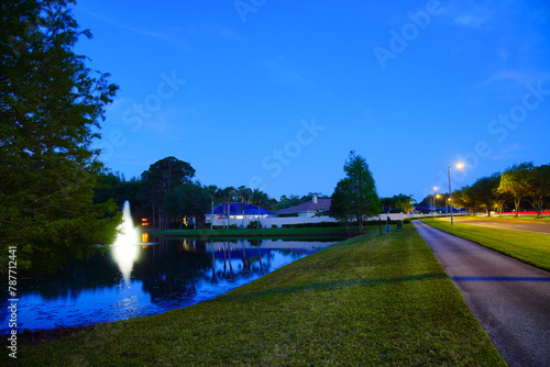 A Florida fountain and pond at night