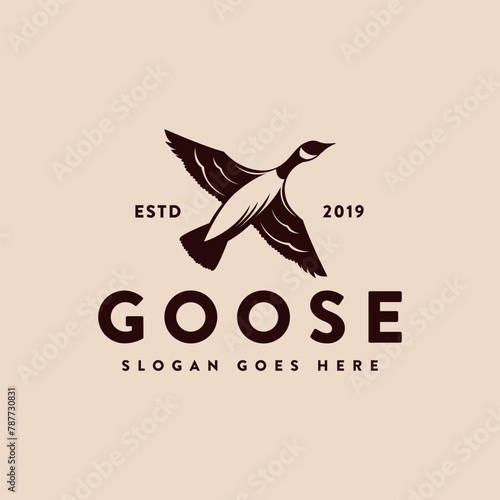 Vintage Canada goose duck flying logo icon vector template on light background