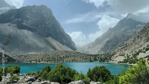 The Alaudin (Chapdara) lakes, lying at an altitude of 2800 m, are considered one of the most beautiful lakes of the Fan Mountains. Turquoise mountain lake. Pamiro-Alai. Tajikistan, Pamir 4K photo