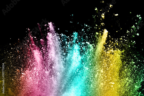 abstract colored dust explosion on a black background.abstract powder splatted background