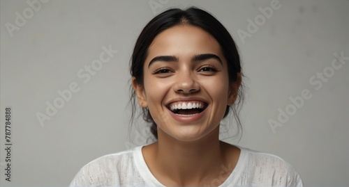 young mexican woman on plain bright white background laughing hysterically looking at camera background banner template ad marketing concept from Generative AI photo