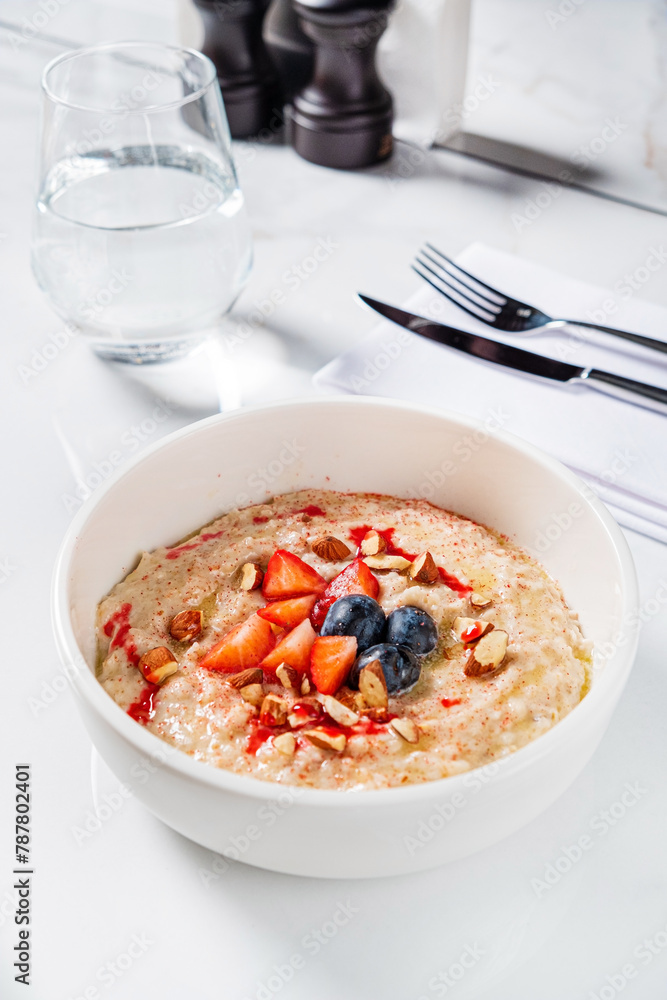 Oatmeal and fresh fruits and nuts Oatmeal and fresh fruits and nuts