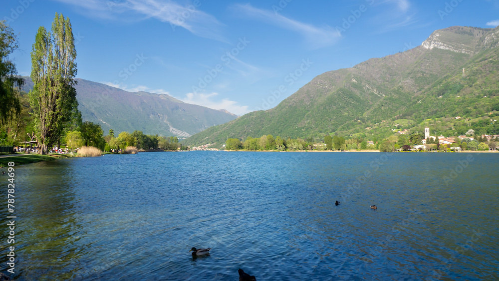 Endine lake, Bergamo, Italy. Wonderful view of the lake in summer. Touristic destination. The lake is a protected natural environment classified as a natural park Endine lake, Bergamo, Italy. Wonderful view of the lake in summer. Touristic destination. The lake is a protected natural environment classified as a natural park