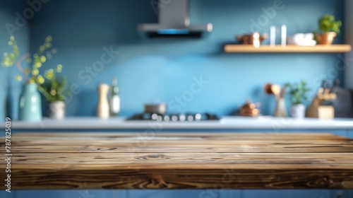 Empty wooden countertop with defocused kitchen blue background