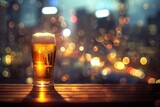Glass of beer on wooden table with defocused city lights background