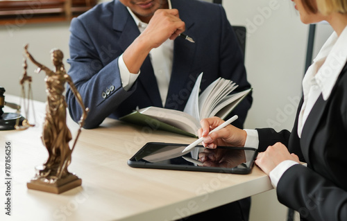 judge on wooden table And experienced lawyers meet with clients and give advice behind the scenes. legal services legal consulting concept