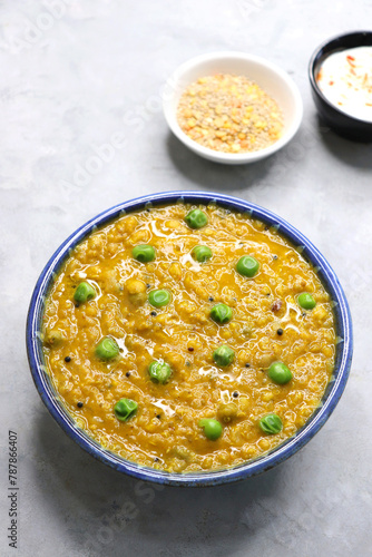 Healthy Quinoa dal khichdi. Made with quinoa, lentils, veggies, and spices, this quinoa dal khichdi is a one pot nutritious weight loss meal. Served with yogurt or curd. Copy Space