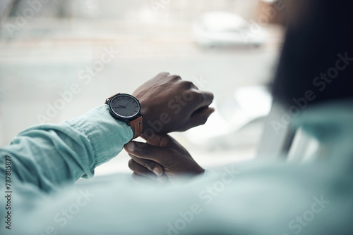 Business, person and watch to check time, schedule or appointment for meeting, deadline or reminder to be punctual. Professional agenda, plan and urgency with wristwatch, accessory or jewelry photo