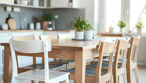 Clean dining table and chairs in interior of kitchen © Oleksiy