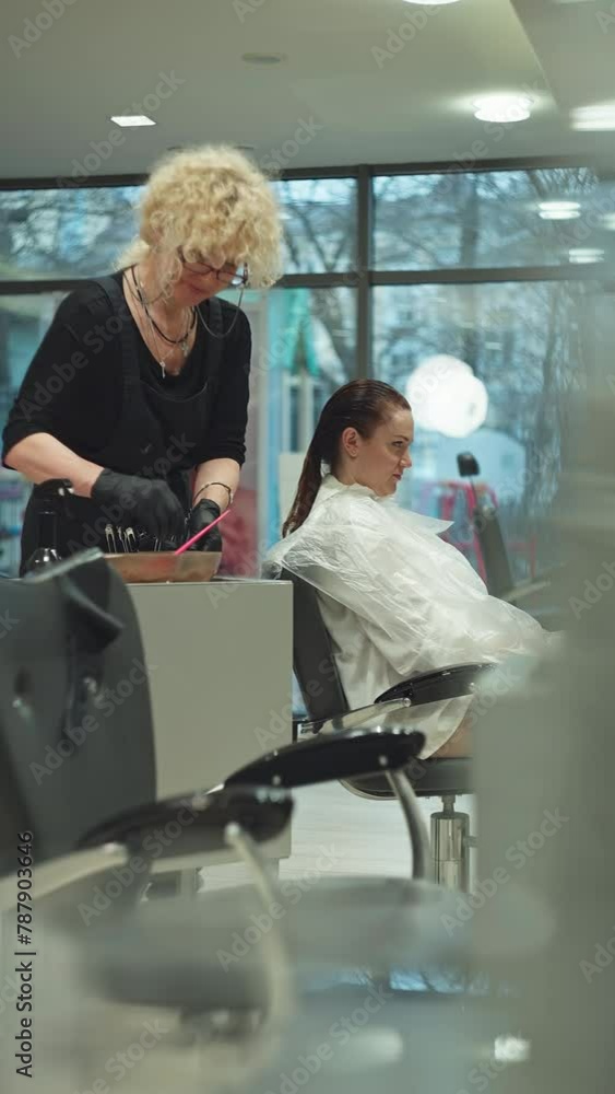 Beauty Procedure: Hair Colorist's Precise Dye Application - Salon Makeover. High quality 4k footage Beauty Procedure: Hair Colorist's Precise Dye Application - Salon Makeover. High quality 4k footage
