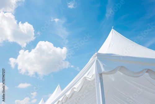 White wedding tent against blue sky