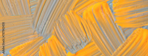 Fototapeta Naklejka Na Ścianę i Meble -  Abstract art background dark yellow and gray colors. Watercolor painting on canvas with orange strokes and splash.