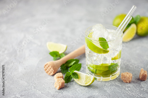 Caipiroska cocktail with lime and mint in rocks glass