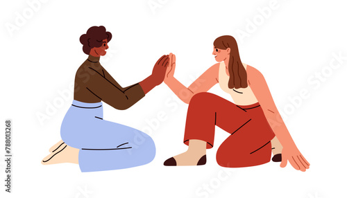 Happy young women giving high five, gesturing. Girls friends playing clapping game, sitting on floor. Joyful communication, relationship. Flat vector illustration isolated on white background