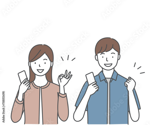 スマートフォンを持つ笑顔の若い男性と女性