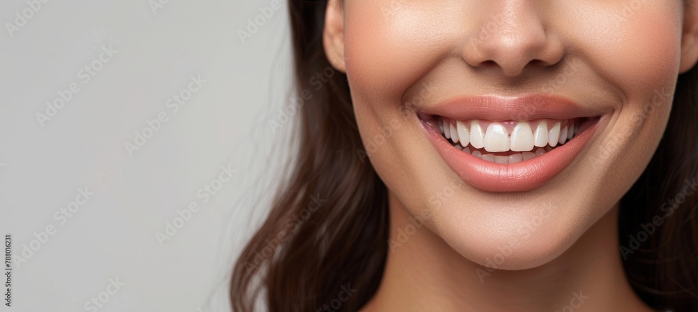 woman smiling with white teeth close up in a dental clinic background with a banner for a healthy smile and clean teeth concept. Copy space for a text banner stock photo concept. woman smiling with white teeth close up in a dental clinic background with a banner for a healthy smile and clean teeth concept. Copy space for a text banner stock photo concept.