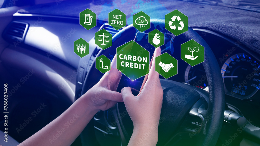 Carbon credit concept, Trader using smartphone to trade carbon credit on application, carbon etf to invest in sustainable business, green climate funds investment, Net zero emission, Clean technology. Carbon credit concept, Trader using smartphone to trade carbon credit on application, carbon etf to invest in sustainable business, green climate funds investment, Net zero emission, Clean technology.