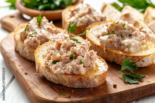 French seafood rillettes or pate on a baguette with homemade cream isolated on white background