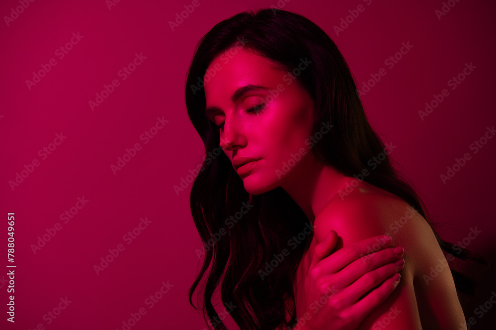 Obraz premium Photo of girl touch skin body feel tenderness close eyes isolated pink color background