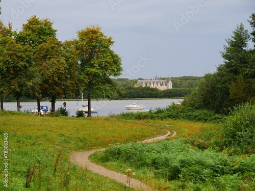 Chateau de la Gascherie, La Chapelle sur Erdre, France, manor house, Monuments Historiques. View from the east bank of the Erdre River. With some boats from the Port des Charettes in the foreground photo