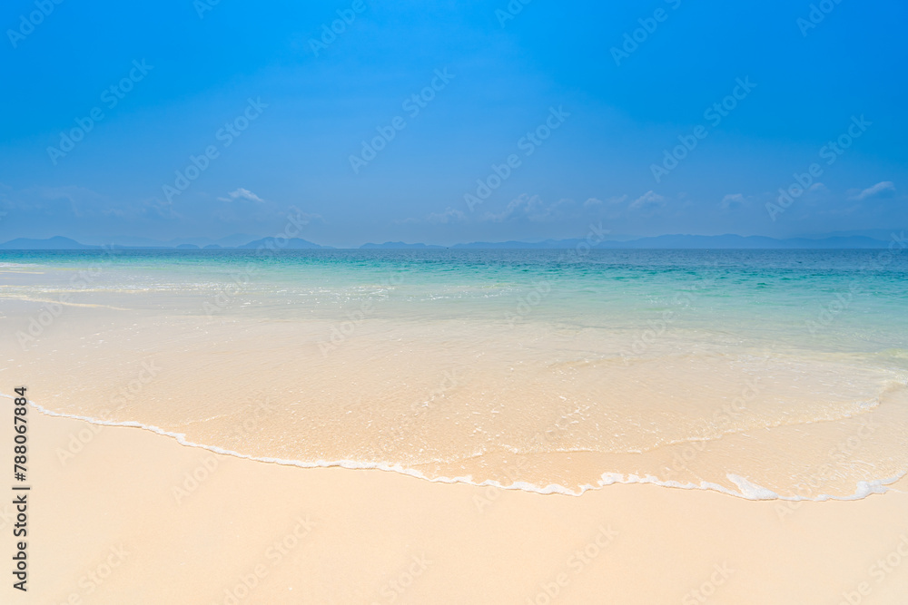 Beautiful sandy beach and sea water and waves in southern Thailand, Asia Beautiful sandy beach and sea water and waves in southern Thailand, Asia