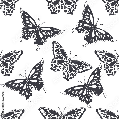 seamless pattern with black butterflies on a white background
