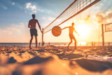 Young people playing beach volleyball during golden sunset. Summertime concept