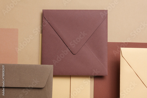 Set of floating envelopes and cards on beige background. Invitations, corporate identification. Creative layout