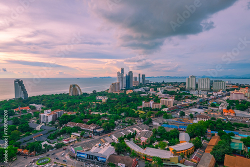Aerial view of Pattaya city with clouds. Cityscape of Pattaya city, Thailand. Image contain of noise and dust. Select focus. photo