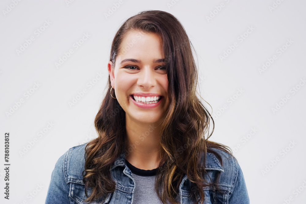 Portrait, woman and happy with smile by studio background for mockup space, comic joke and excited expression. Face, isolated and female person by grey backdrop for happiness, meme and gen z comedy Portrait, woman and happy with smile by studio background for mockup space, comic joke and excited expression. Face, isolated and female person by grey backdrop for happiness, meme and gen z comedy